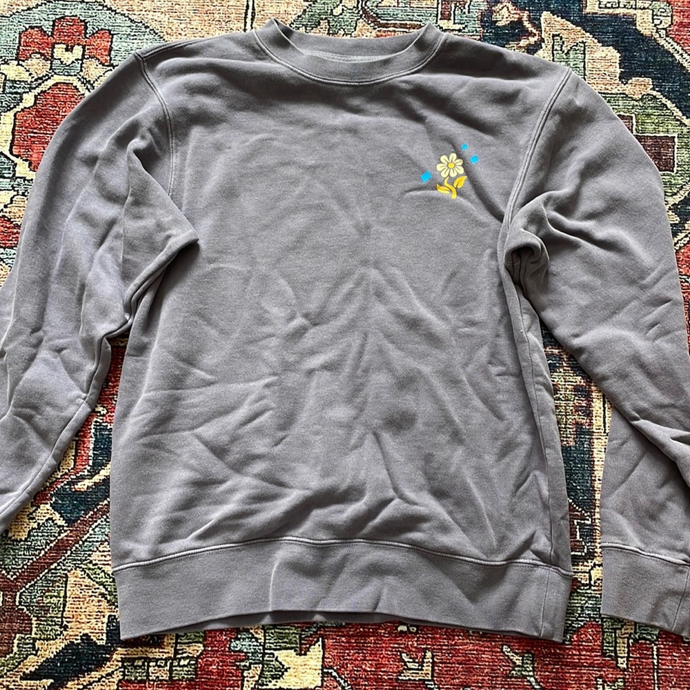 this is an extra small light purple, long sleeve crewneck